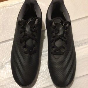 Mens black Adidas cleats, size 9, good condition